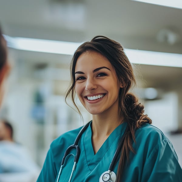 doctor_or_nurse_overlooking_a_patient_squared