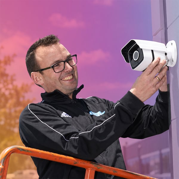 man_installing_camera_squared
