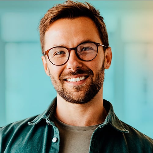 squared_smiling_man_looking_at_camera