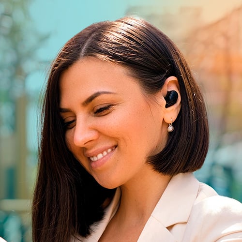 squared_smiling_woman_looking_at_phone