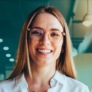 squared_woman_smiling_in_cafe