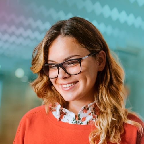 squared_woman_with_red_shirt_smiling