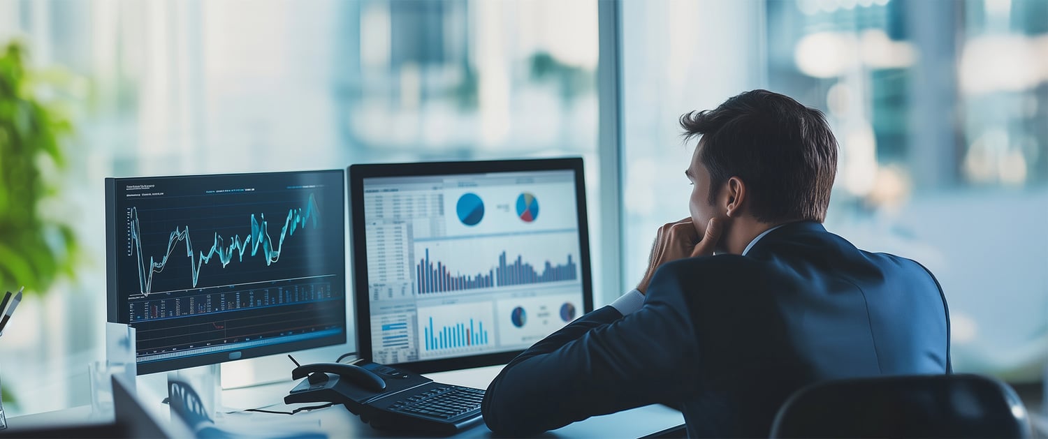 header_banker_looking_at_charts