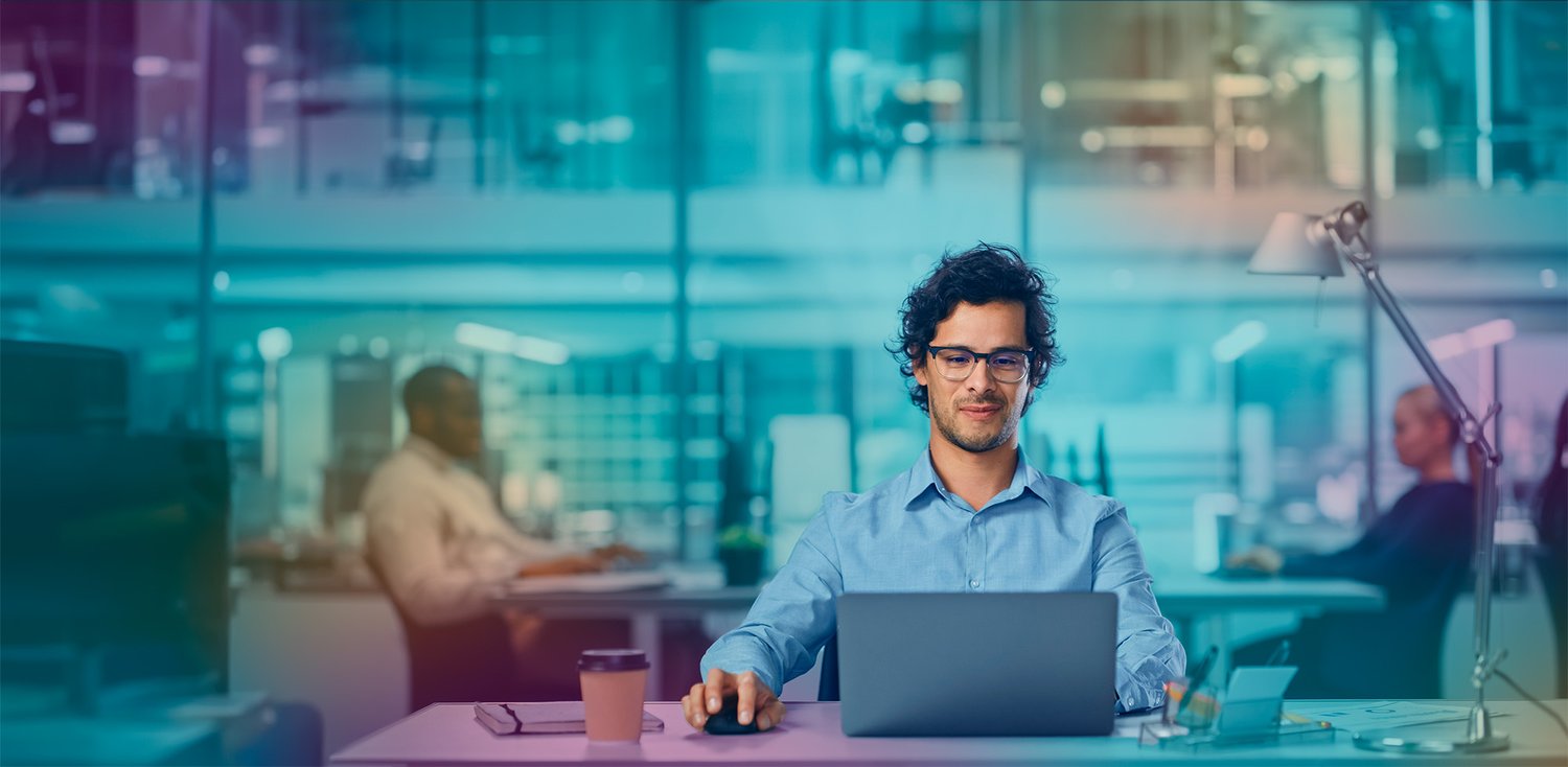 man_in_office_at_laptop