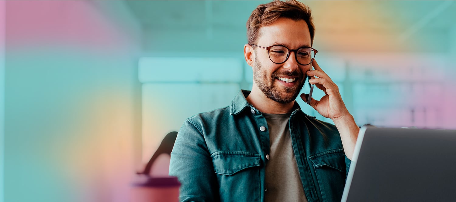 man_with_glasses_on_phone