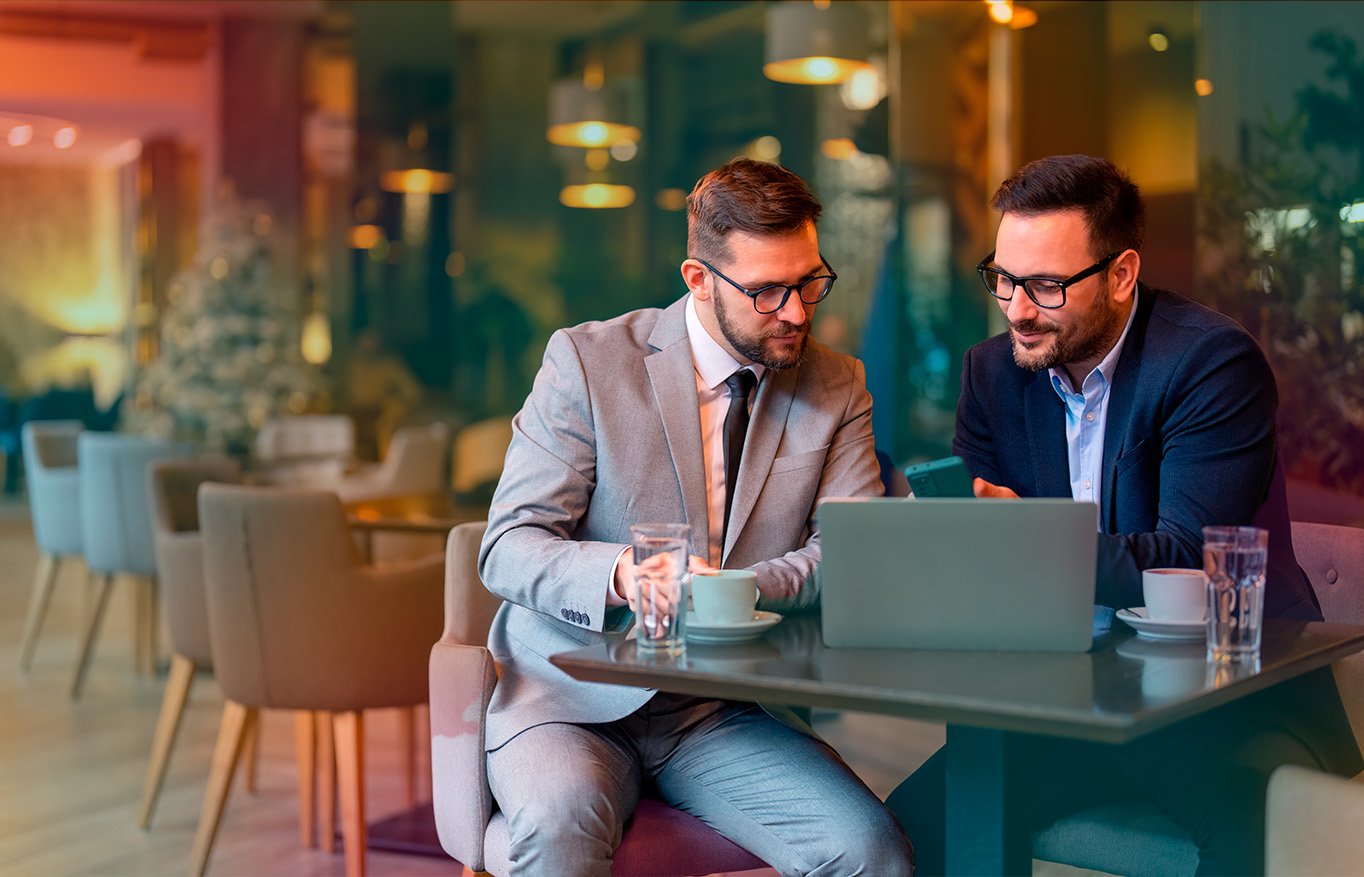 two_business_men_at_laplop