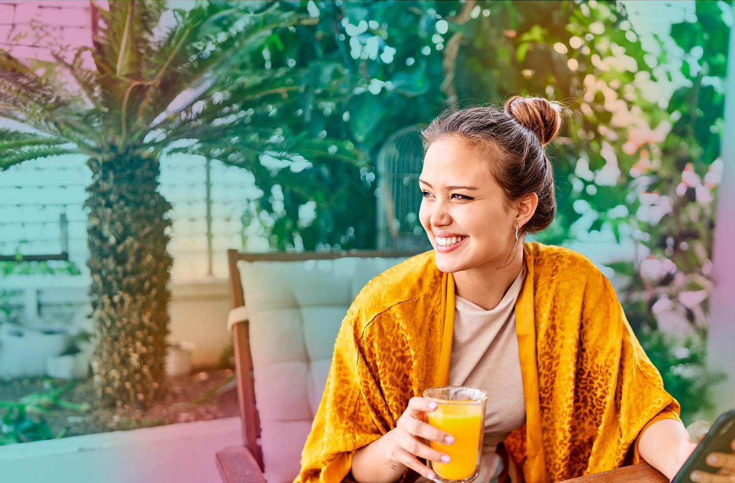 woman_outside_with_a_glass_of_orange_juice