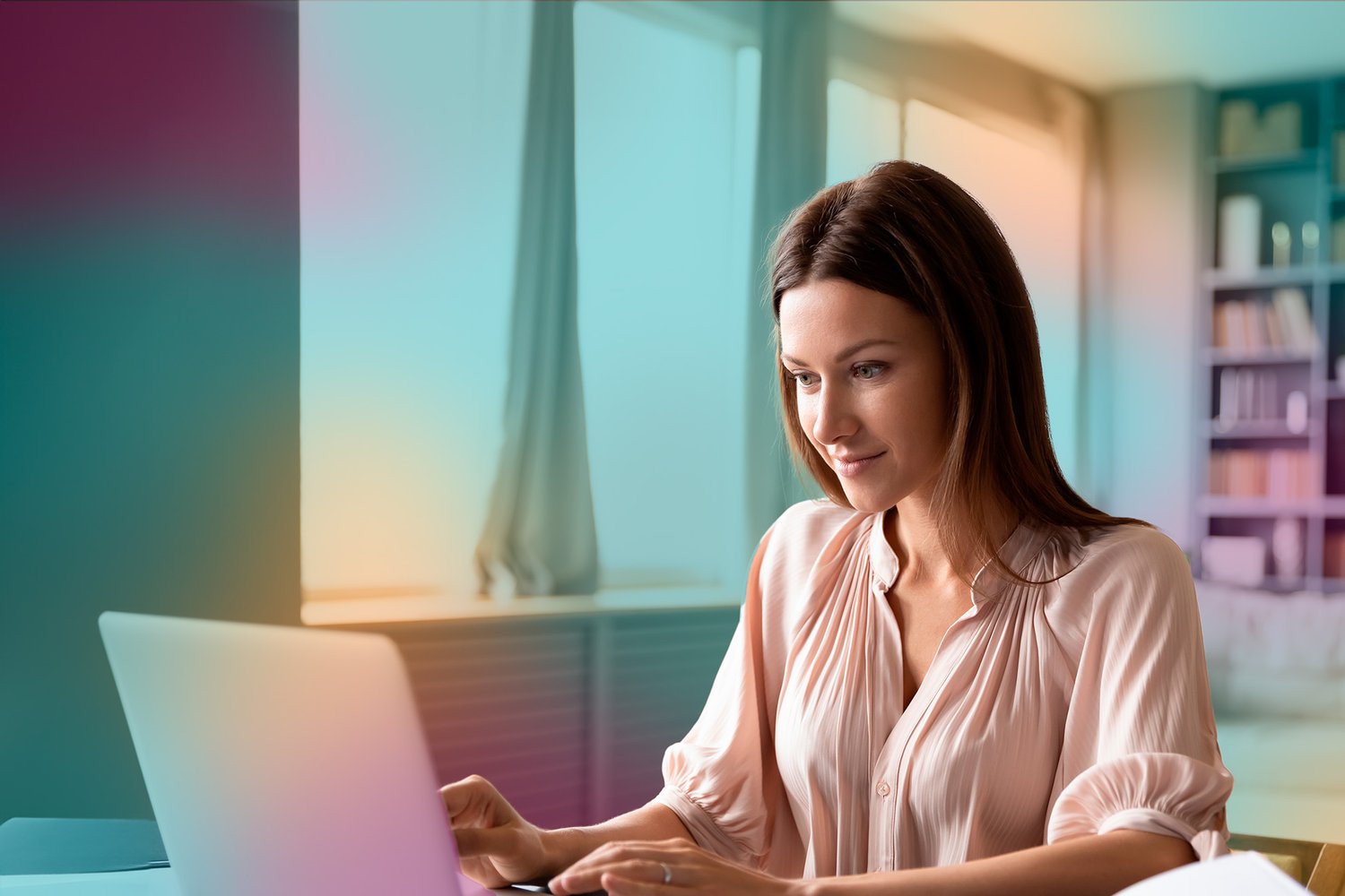 woman_sitting_at_laptop_at_home