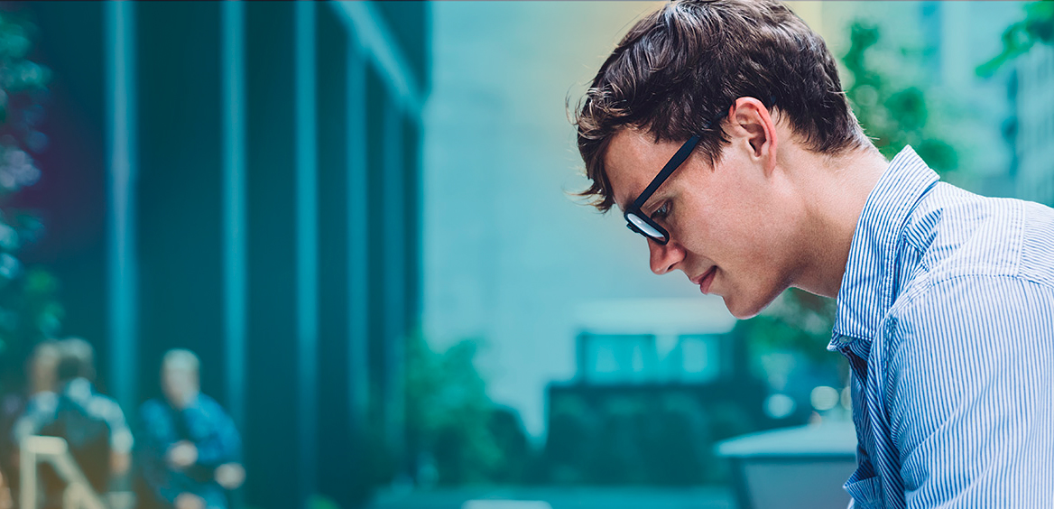 young_man_looking_at_tablet